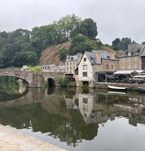 Dinan bridge medieval ramparts Rance valley verdant Brittany landscape