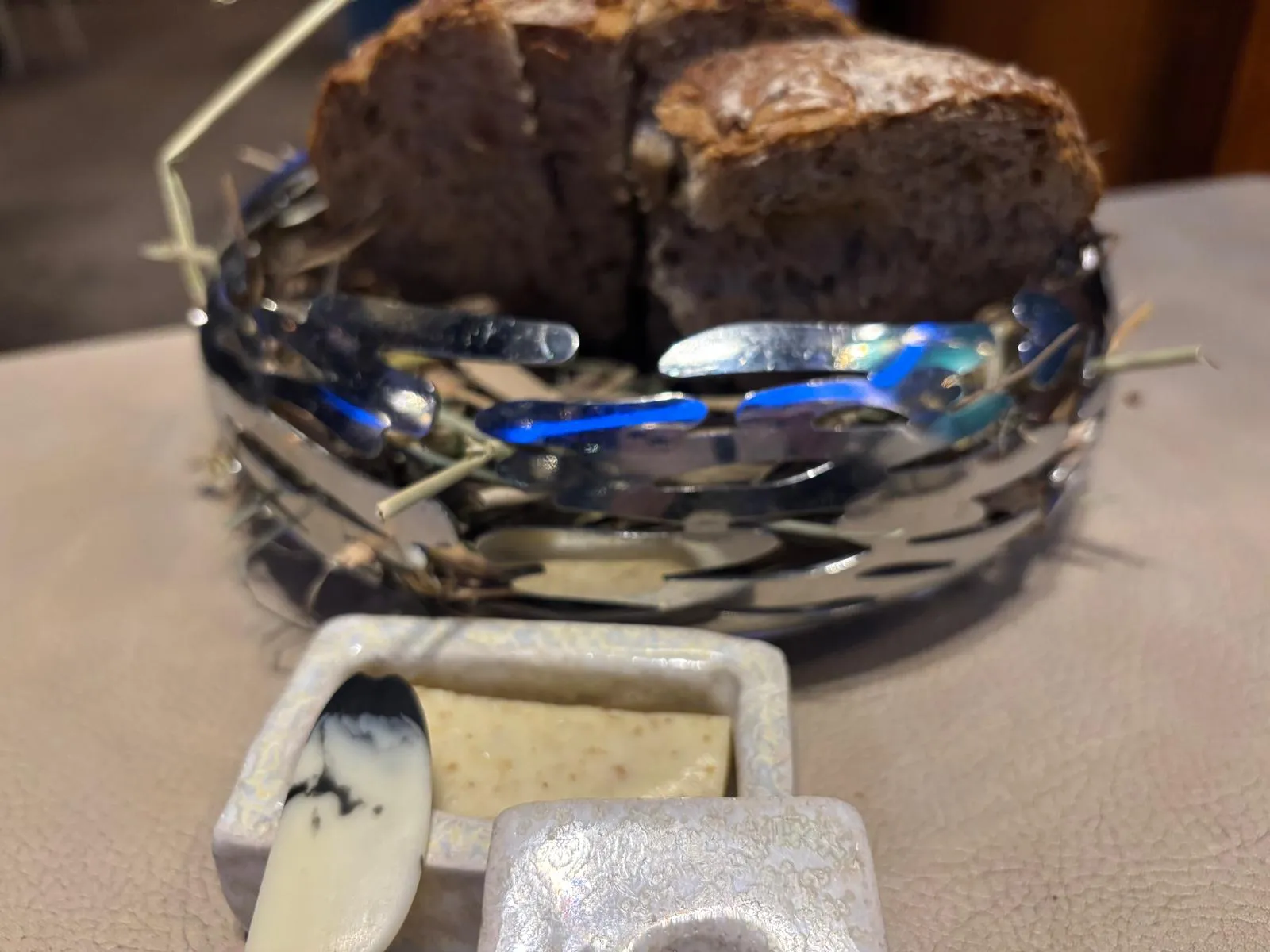 Sourdough bread served with salted butter in a nest, at La Mare aux Oiseaux in the Grande Brière